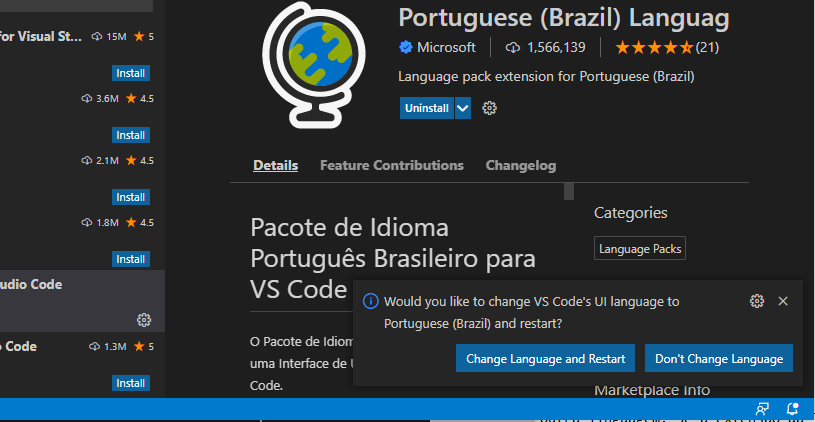 Screenshot que mostra no canto inferior direito da janela o Botão para Reiniciar o vscode com o novo idioma instalado: Change Language and Restart